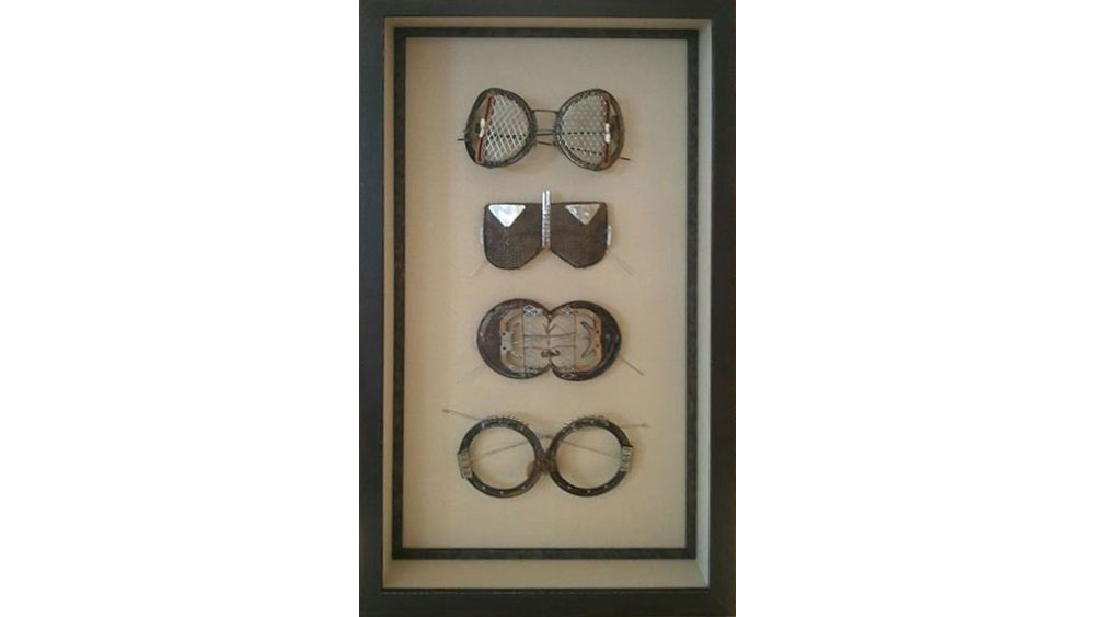 Framed vintage eyeglasses shadow box