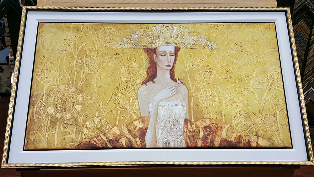 Framed portrait with gold background